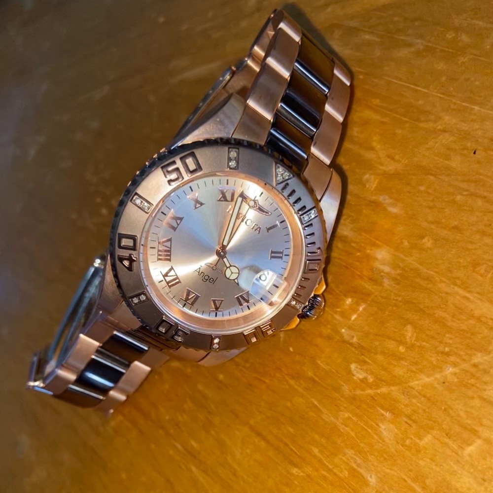 Invicta angel rose gold watch.